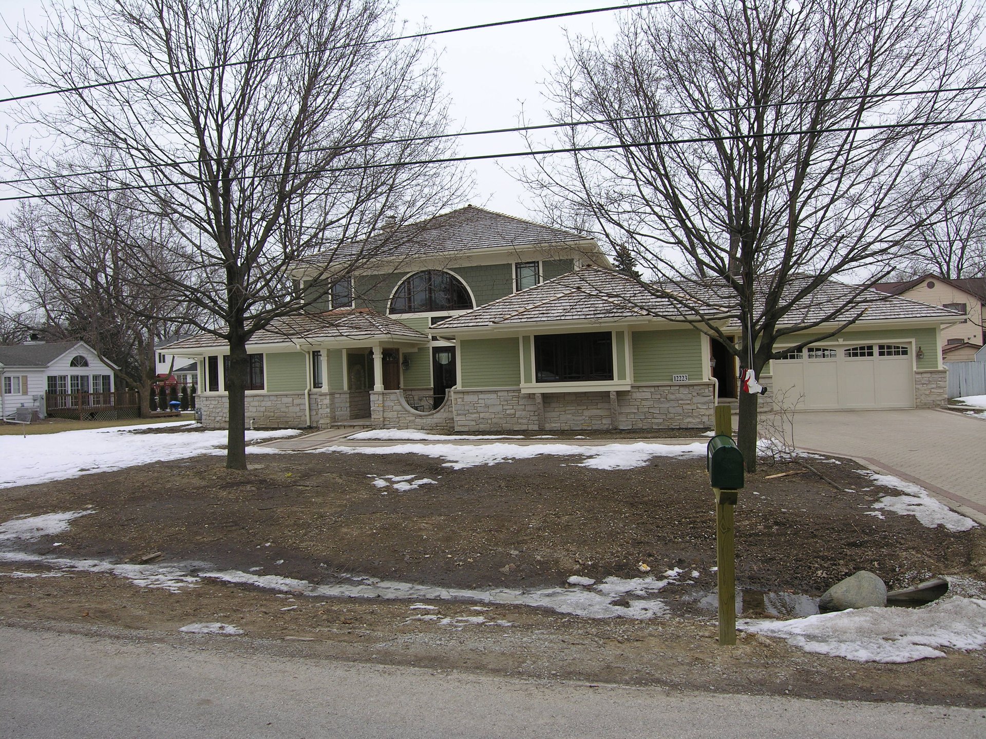 Front-yard view of a Zeiler Construction custom home in Palos Heights