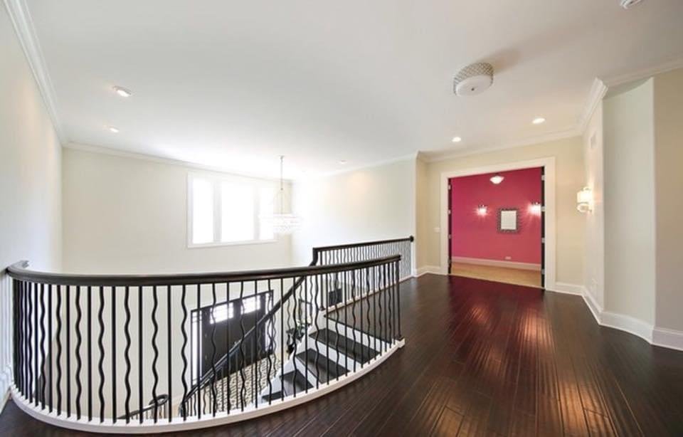 Curved staircase viewed from upper level